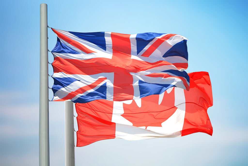 The UK and Canadian flags flying together.